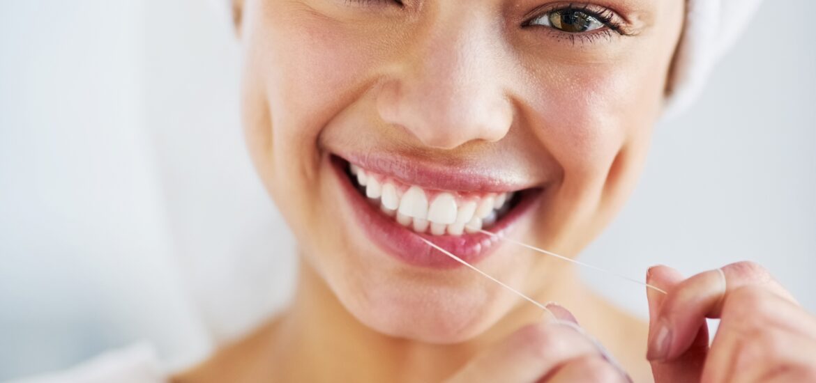 young woman showing off her flawless smile
