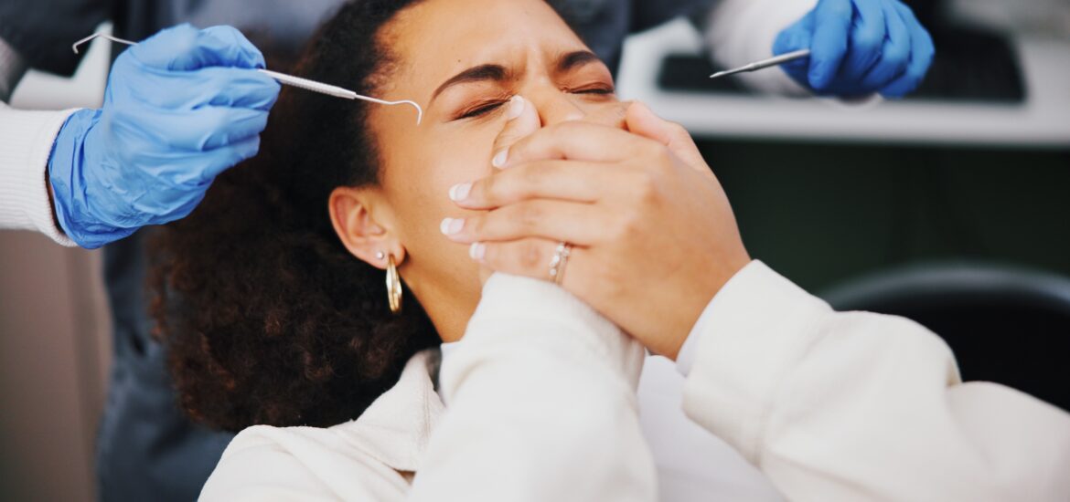 female patient with anxiety covering her mouth, candidate for sedation